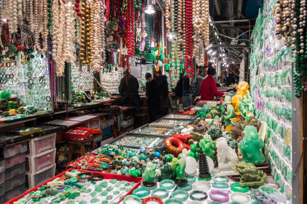 In Hong Kong Jade Market there are many stands selling all kinds of jade, pearls, semi-precious stones. Hong Kong, Kowloon, Yau Ma Tei, January 2018