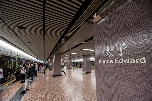 Hong Kong - November 8, 2022 : Passengers at the MTR Prince Edward Station in Kowloon, Hong Kong. Prince Edward Station is a rapid transit station on the Kwun Tong and Tsuen Wan Line of the MTR system in Hong Kong.