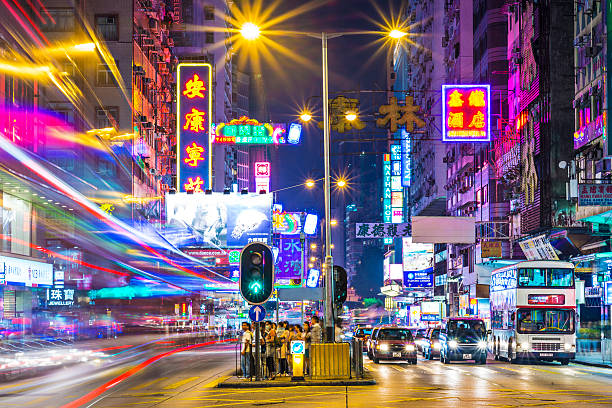 Hong Kong, China - October 8, 2012: Traffic and pedestrians on Nathan Road. Nathan Road is the main thoroughfare through Kowloon.